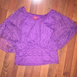 Lace tank top with lace overlay.